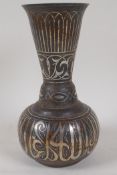 A bidri iron and silver inlaid vase, 8½" high