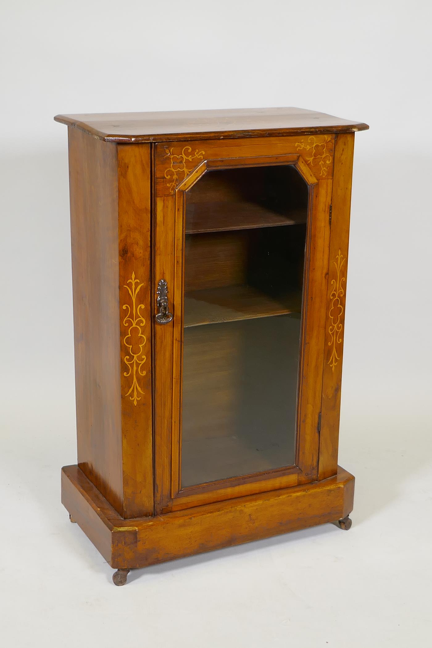 A Victorian inlaid walnut display cabinet with canted corners and single glazed door, raise on a - Image 2 of 5