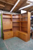 A 1970s G-Plan E. Gomme teak Fresco modular wall unit with two straight and one corner section,