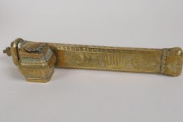 A Persian engraved brass scribes box, 9½" long