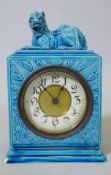 A Burmantofts Faience mantel clock with kylin top, impressed to base, 9" high, chip to base