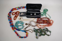 A suite of crystal costume jewellery, necklace, bracelet and clip on earrings, a silver 'Nef'