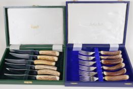 A cased set of Harrods antler handled steak knives marked Harrods J.O. Cutlers and Silversmiths, and