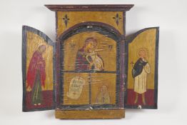 An antique coptic triptych icon, 19½" x 16" opened