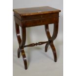 A C19th figures mahogany work box/dressing table, the lift up top fitted with a mirror and candle