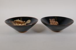 A Chinese Cizhou kiln pottery bowl with carp decoration, and another similar, 6" diameter