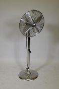 A chrome plate floor standing electric fan, 47" high