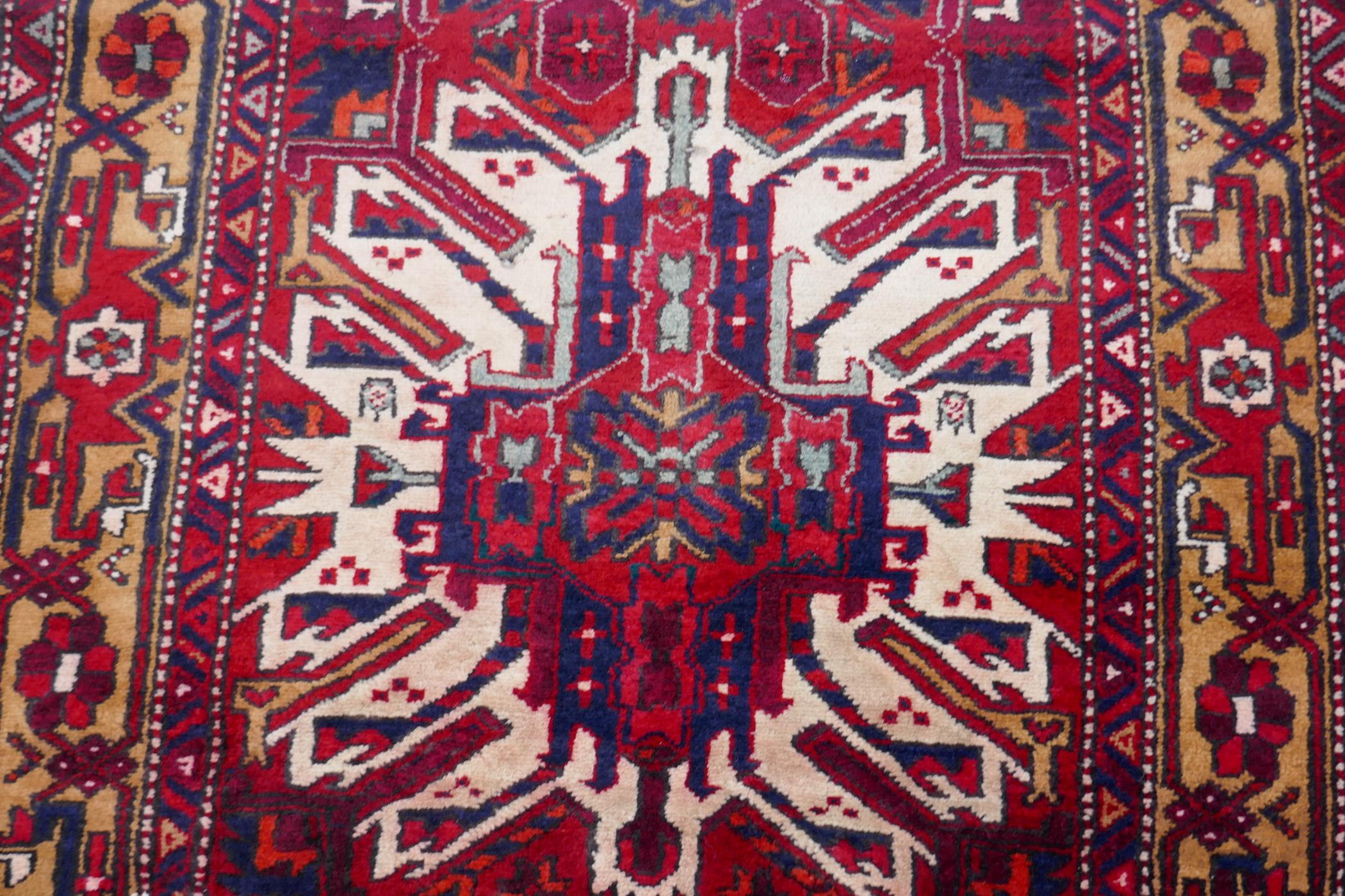 A Persian red ground Heritz runner with a starburst medallion design, 46" x 131" - Image 4 of 8