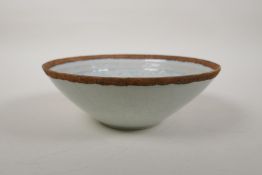 A Song style celadon glazed porcelain bowl with underglaze phoenix and lotus flower decoration, 7"