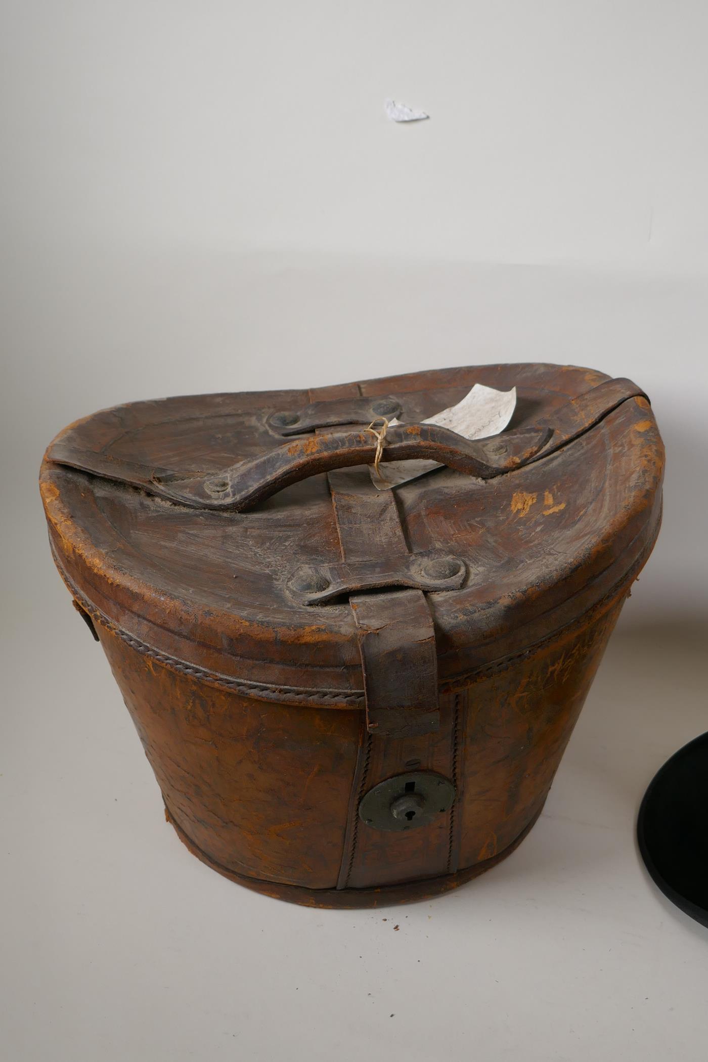 A silk top hat by Henry Heath Ltd in a leather fitted hat box - Image 2 of 7