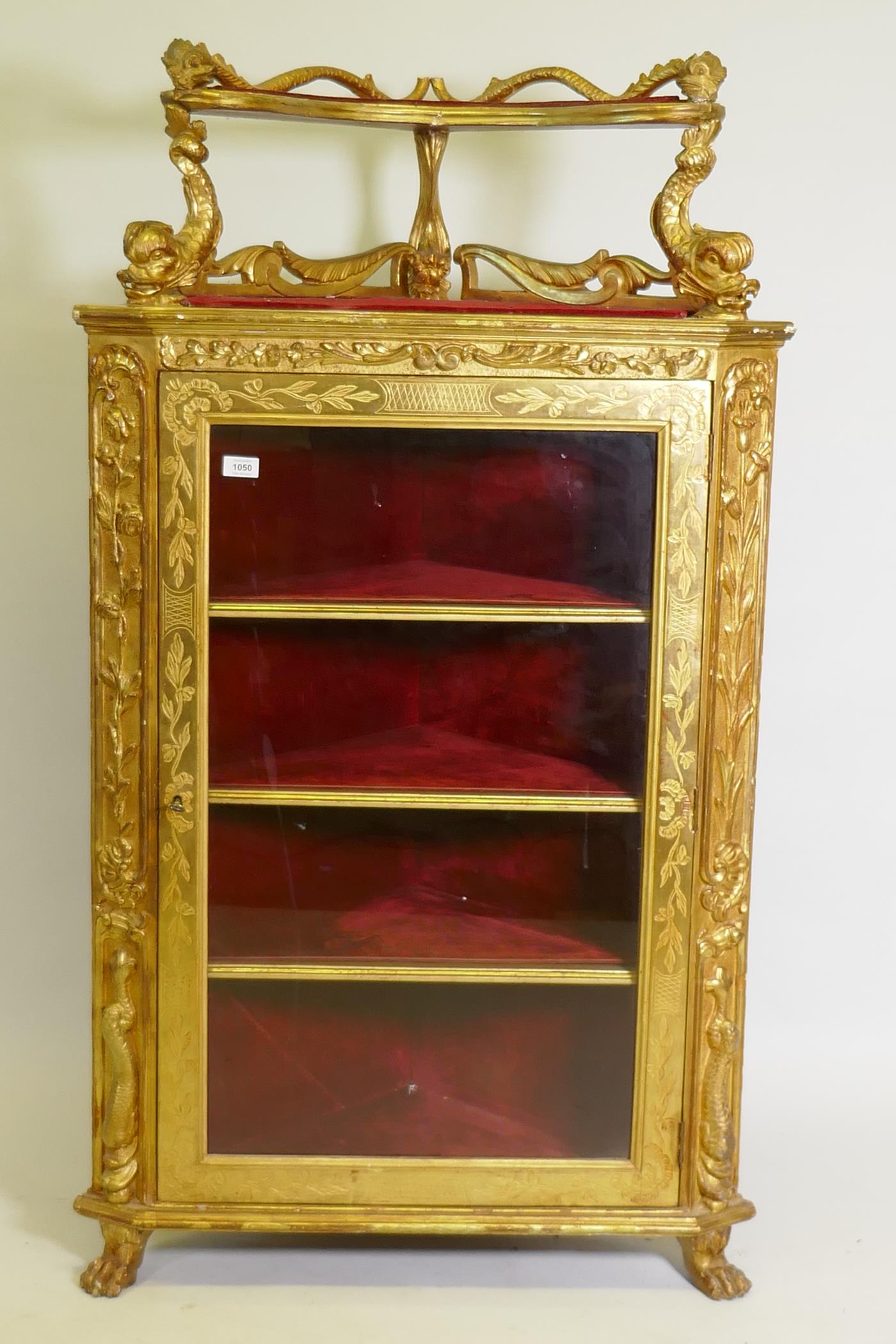 A C19th Italian giltwood corner cabinet, the top with an open shelf supported by dolphins, the - Image 2 of 11