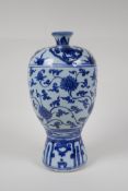 A Chinese ming style blue and white porcelain vase with scrolling lotus flower pattern, 11½" high