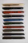 An assortment of fountain pens, including a Parker 61 with 12ct rolled gold case, a Dela Rue