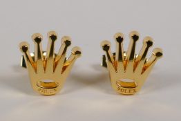 A pair of gilt metal Rolex cufflinks