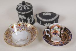 A C19th Crown Derby Japan pattern cabinet cup and saucer, an early Spode cabinet cup and saucer, and