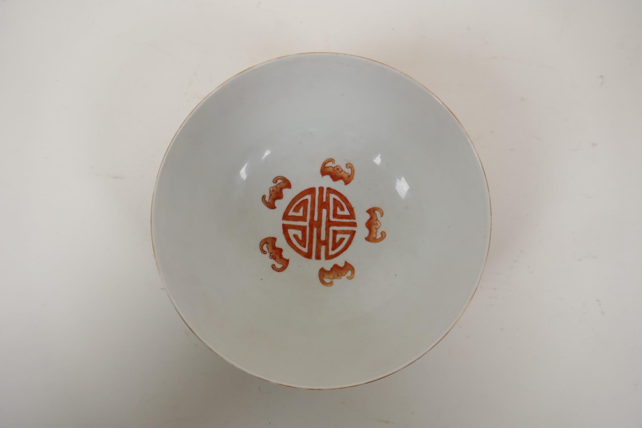 A polychrome porcelain bowl decorated with an iron red and green dragon chasing the flaming pearl, - Image 9 of 14