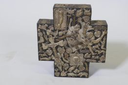 A Mexican folk art 'Milagros' wood cross set with white metal votive figures, stamped Estela Ogazon,