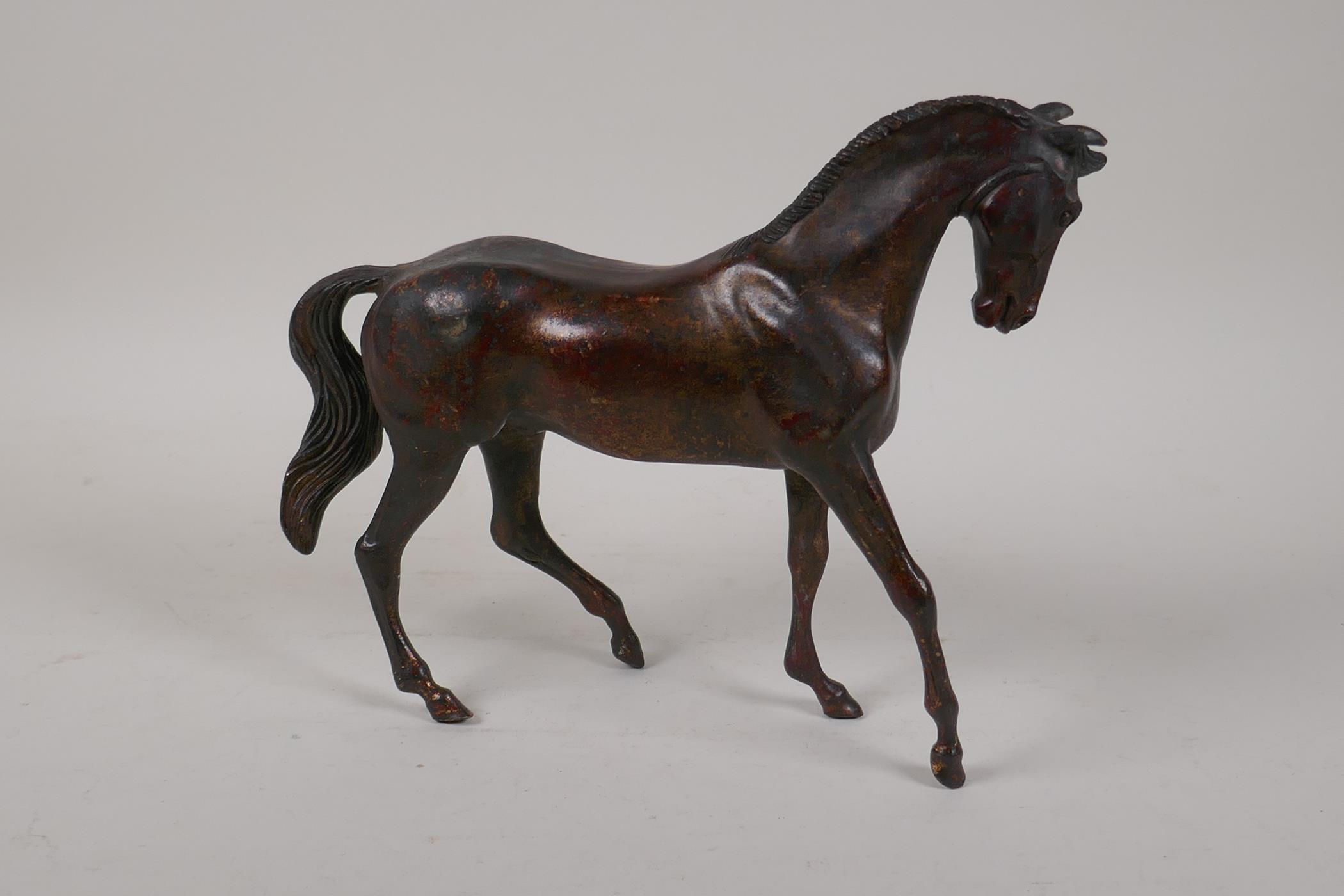 An oriental gilt bronze horse, 10" long, 8" high - Image 5 of 5