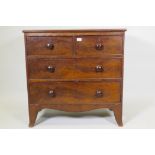 An early C19th figured mahogany chest of two + two drawers, raised on swept supports, 36" x 18" x