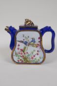 A Chinese blue and gilt enamelled Yixing teapot, with famille rose decorative panels depicting birds
