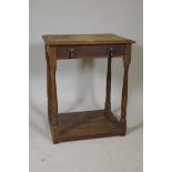 A C19th oak single drawer side table, raised on turned supports with a pot board, 24" x 18" x 29"