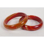 A pair of agate bangles, 3" diameter