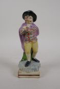 An early C19th Staffordshire pearl-ware figure of Winter, draped in a purple cape, AF, 7½" high