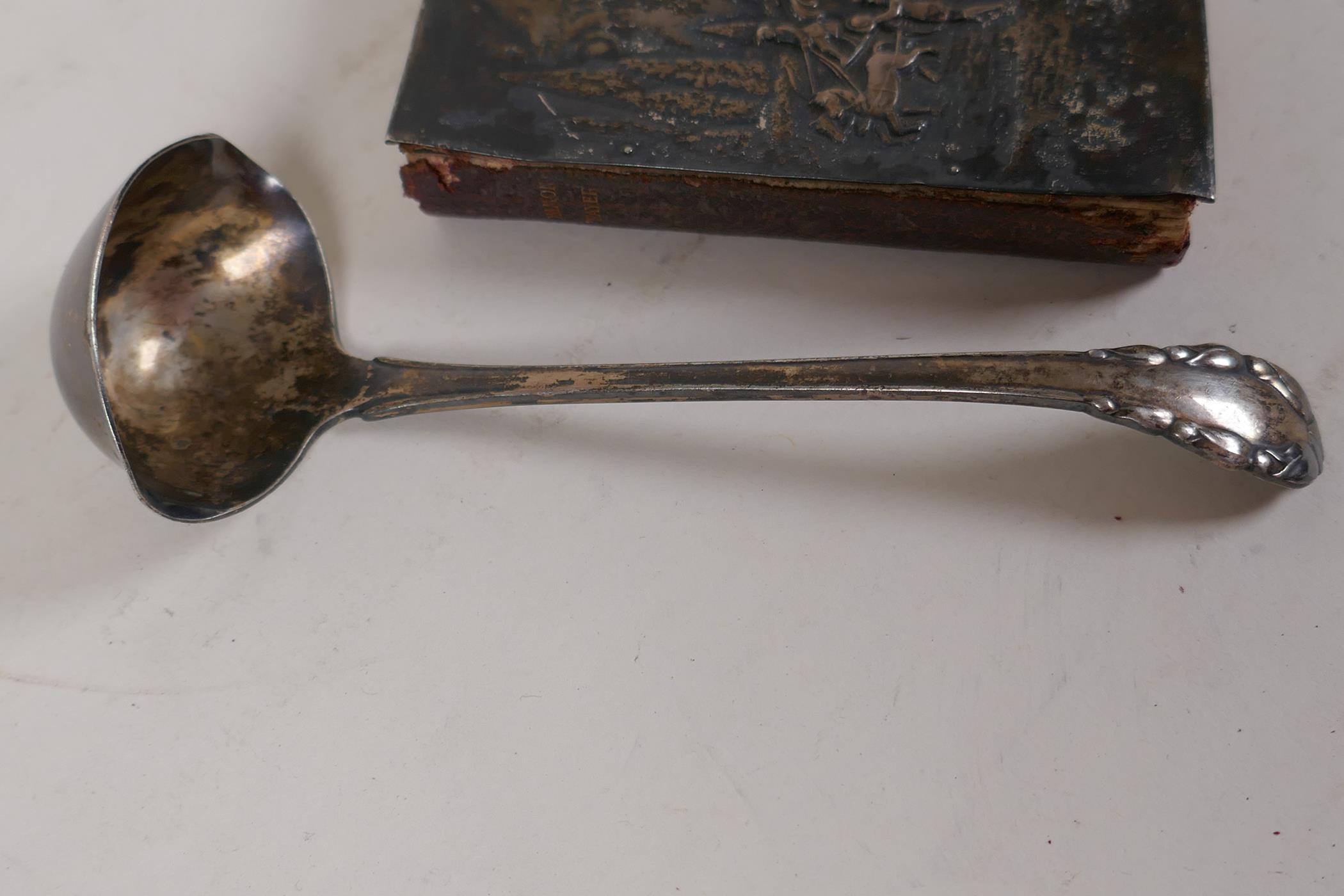 A Continental 925 silver brandy ladle with London import marks, 30g, and a 'purse' book of common - Image 3 of 5
