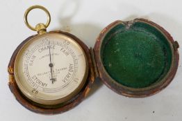 A Negretti and Zambra of London pocket barometer No 30086, in original case, dial 2" diameter