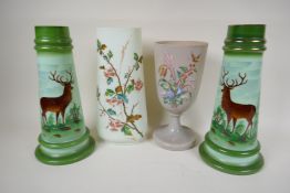 A C19th milk glass vase painted with hawthorn blossom, 11" high and a pair of green milk glass vases