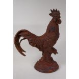 A cast iron garden figure of a cockerel, 16" high