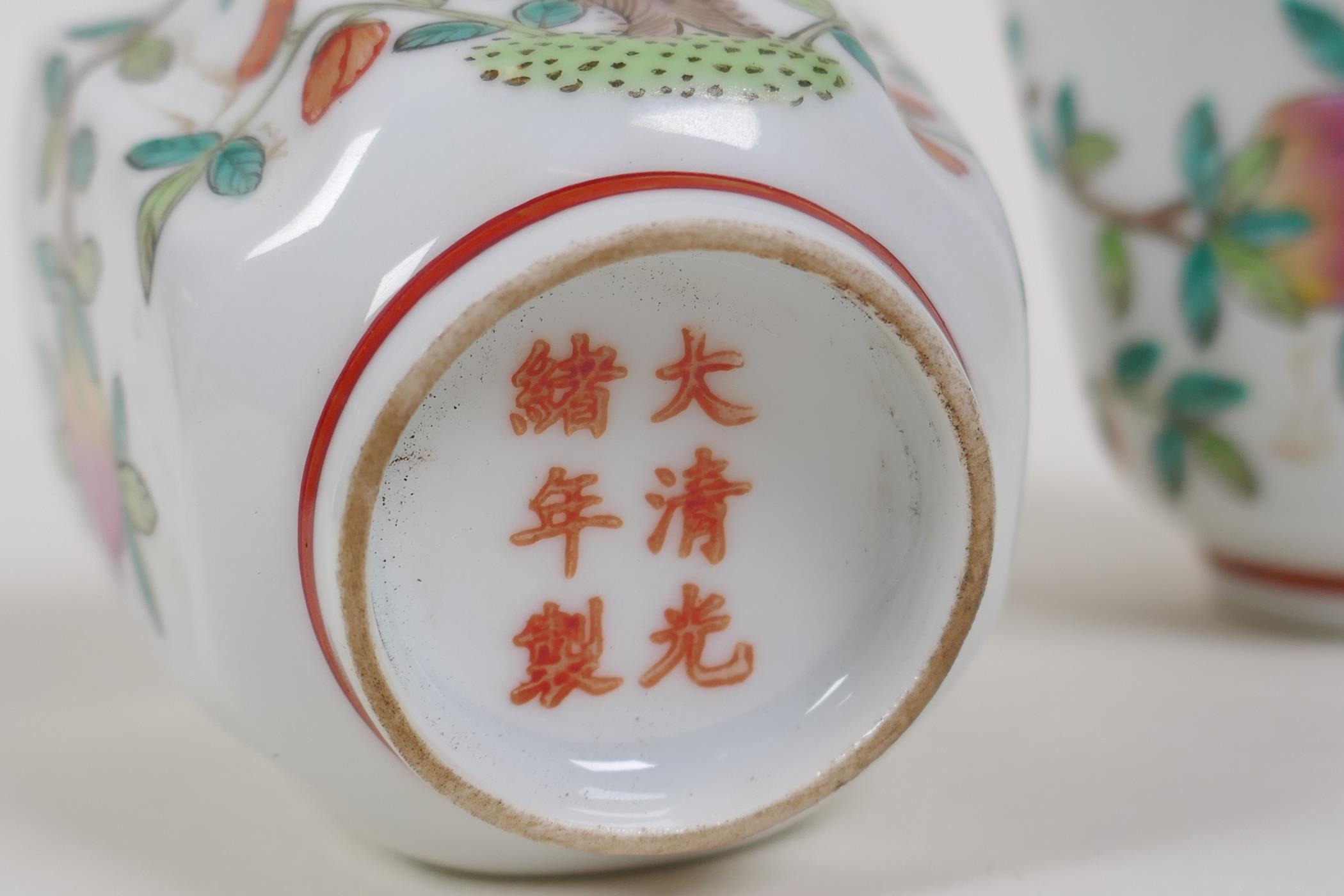 A pair of famille vert enamelled porcelain tea bowls with peach tree decoration, Chinese Guangxu 6 - Image 6 of 6