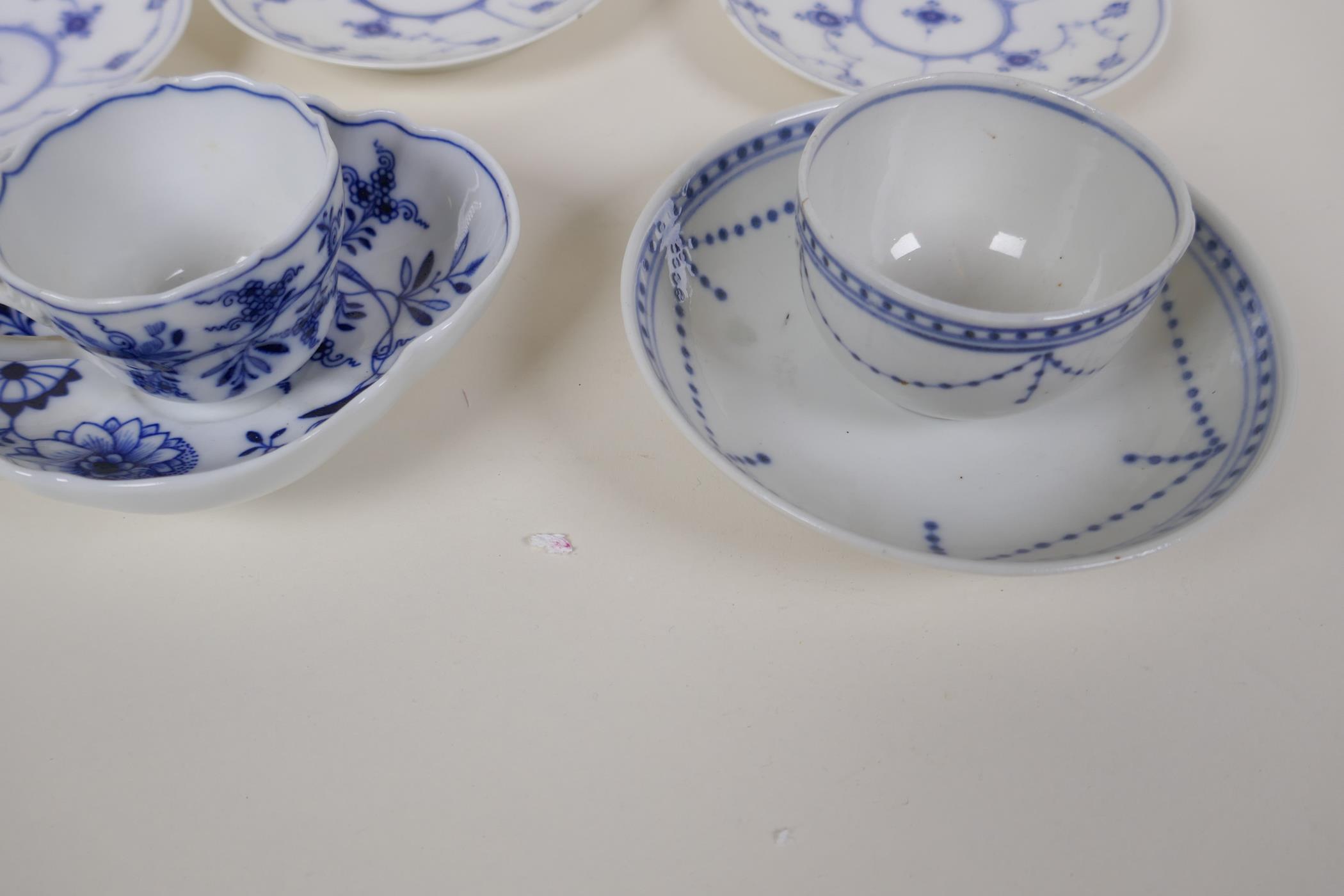 A Meissen onion pattern blue and white porcelain petal shaped cup and saucer, AF, an early - Image 6 of 9