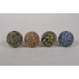 Four antique Islamic glass beads