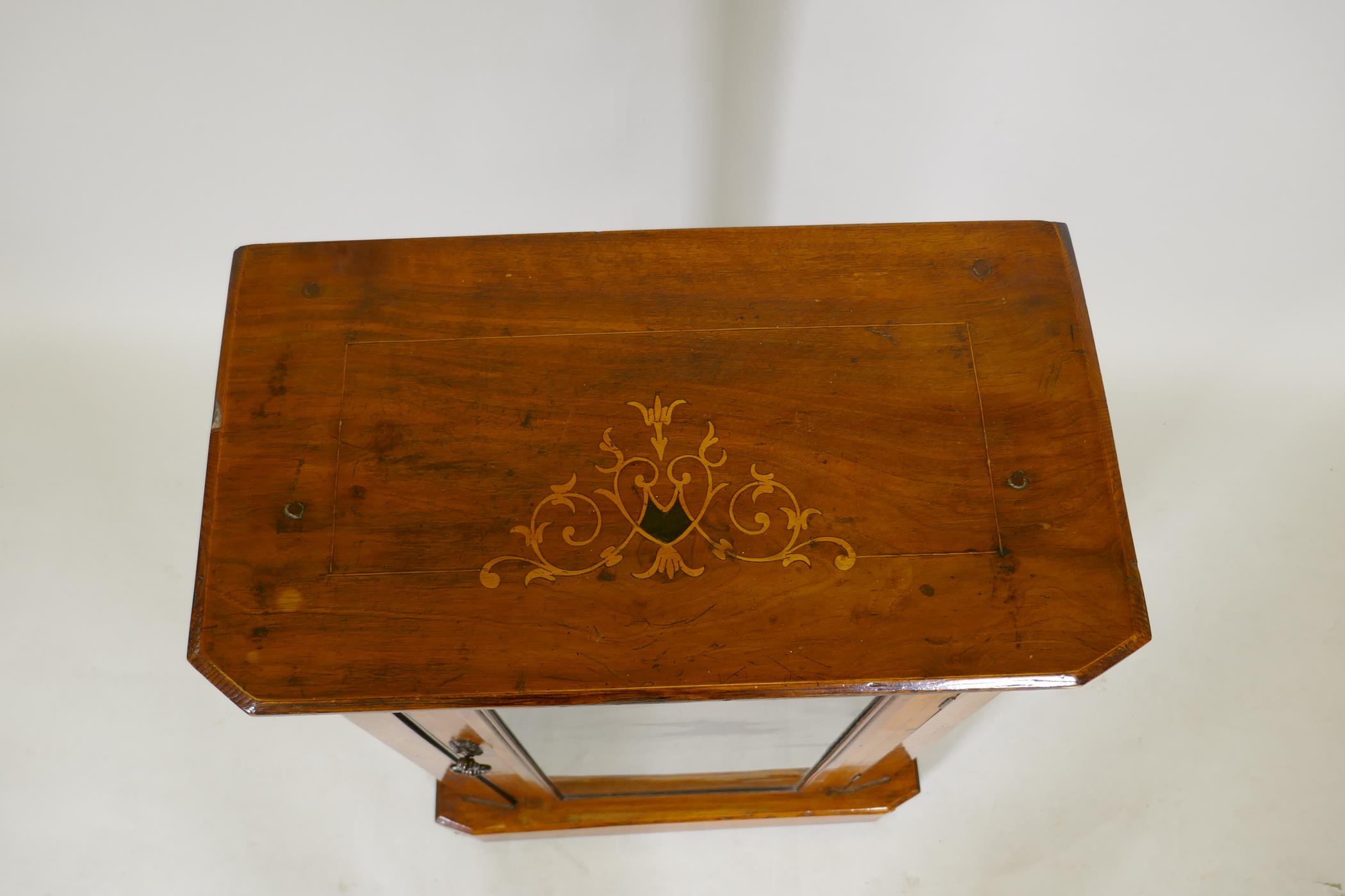 A Victorian inlaid walnut display cabinet with canted corners and single glazed door, raise on a - Image 5 of 5