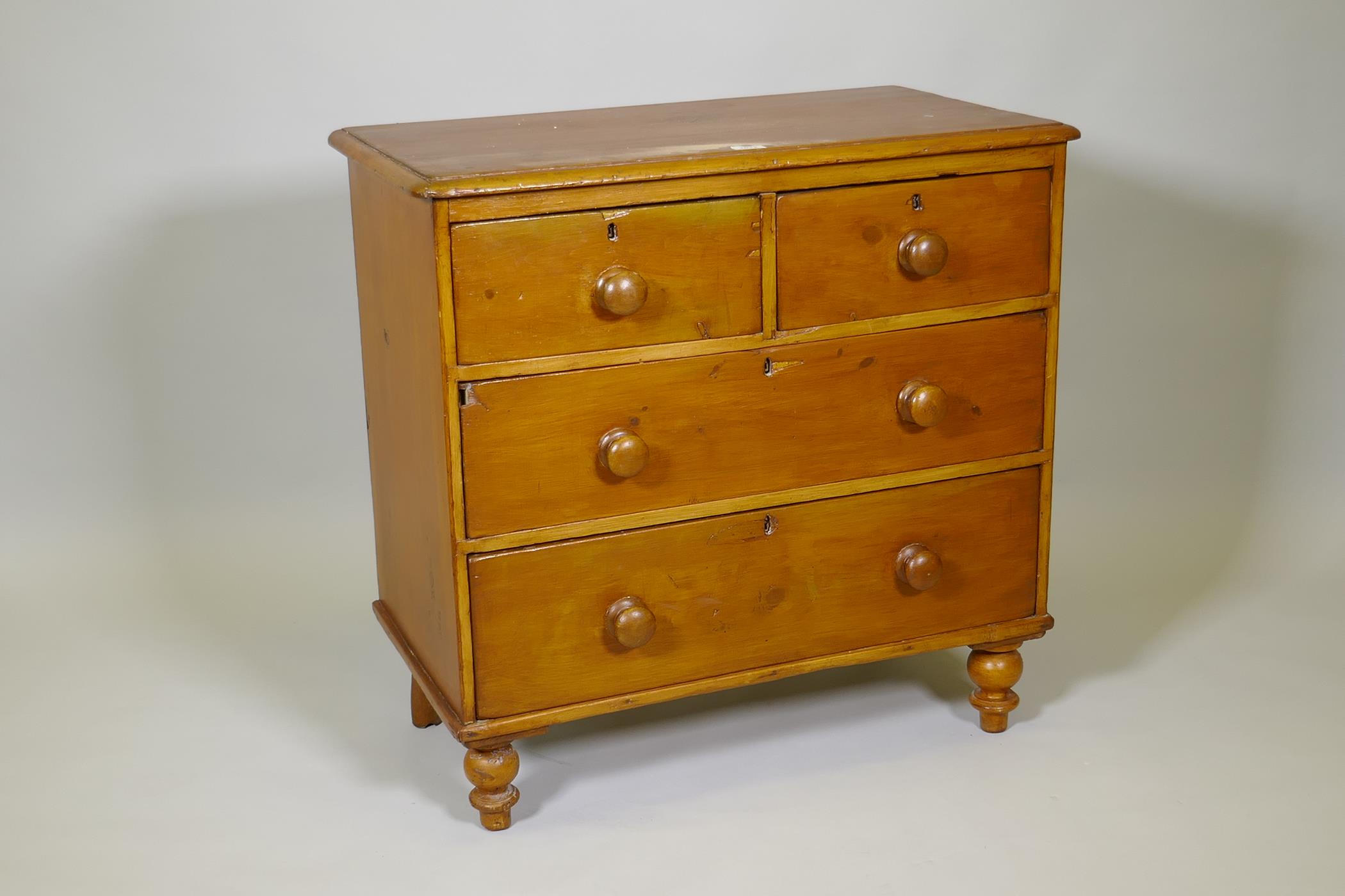 A C19th stripped pine chest of two short over two long drawers, AF, on ring turned supports, 33" x