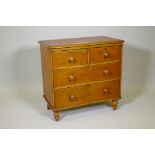 A C19th stripped pine chest of two short over two long drawers, AF, on ring turned supports, 33" x