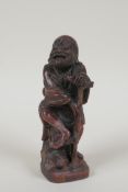 A Chinese carved soapstone figure of Lohan, 6" high