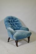 A Victorian button back nursing chair, stamped 3188 with Cope and Collinson castors