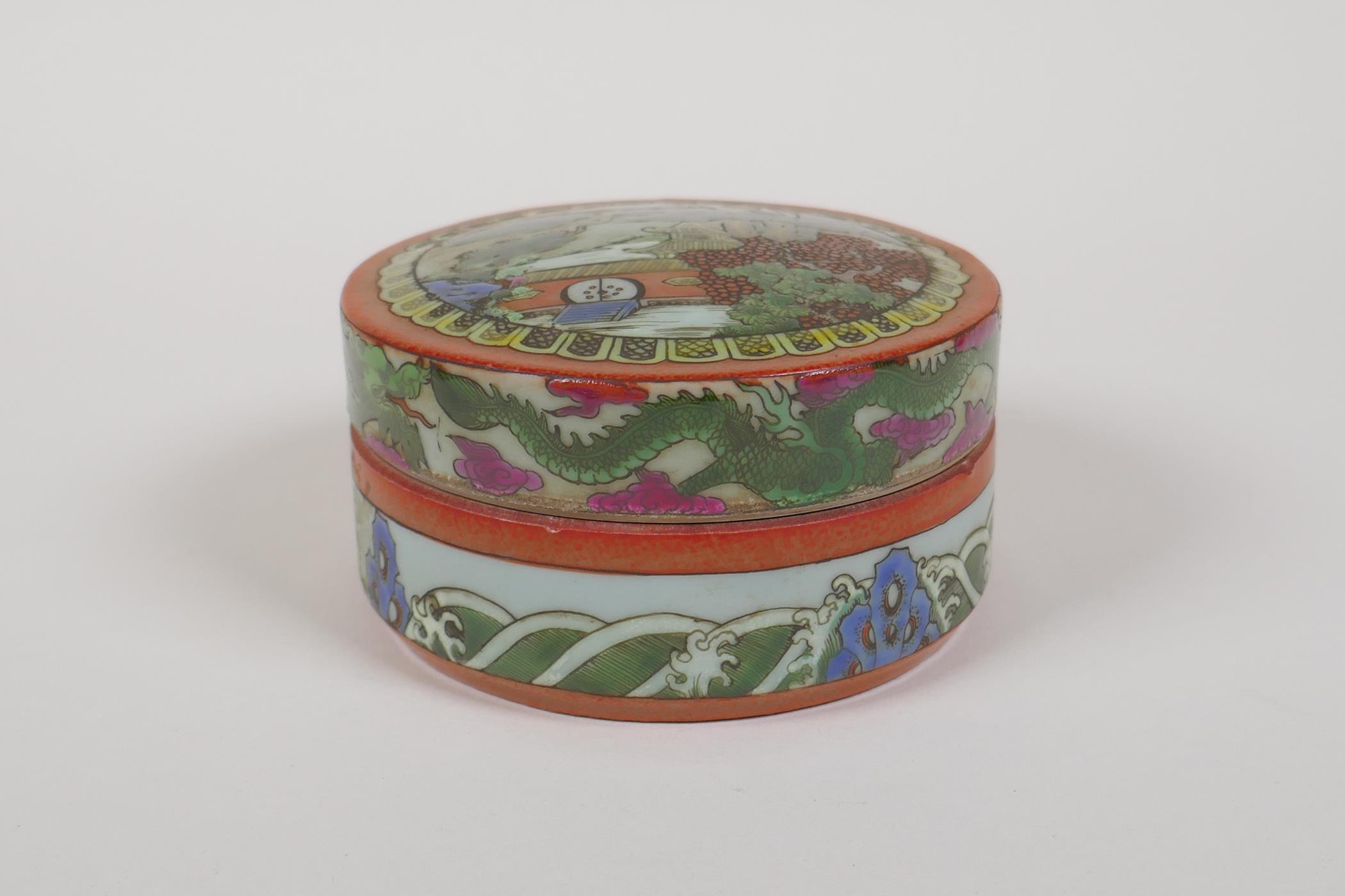 A famille vert porcelain cylinder box and cover, decorated with a landscape scene, dragons and the - Image 3 of 12