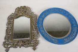 A pierced brass framed pier glass mirror, decorated with the head of Baccus, 15" x 10", and a pier