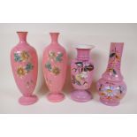 A pair of C19th pink milk glass vases, painted with flowers, 12½" high, 1AF, and two other similar