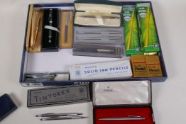 A collection of ballpoint pens, perpetual pencils, ink pens, pencils etc, including a Cross Slim pen