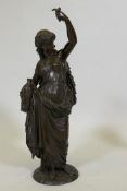 A good C19th bronze figure of a classically attired woman bearing a jug of wine, unsigned, 22" high