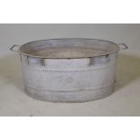 A large galvanised metal tub, 33" x 20" x 13" high