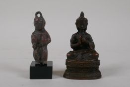 An oriental archaic style bronze figures and a Sino Tibetan bronze figure of Buddha, largest 3½"