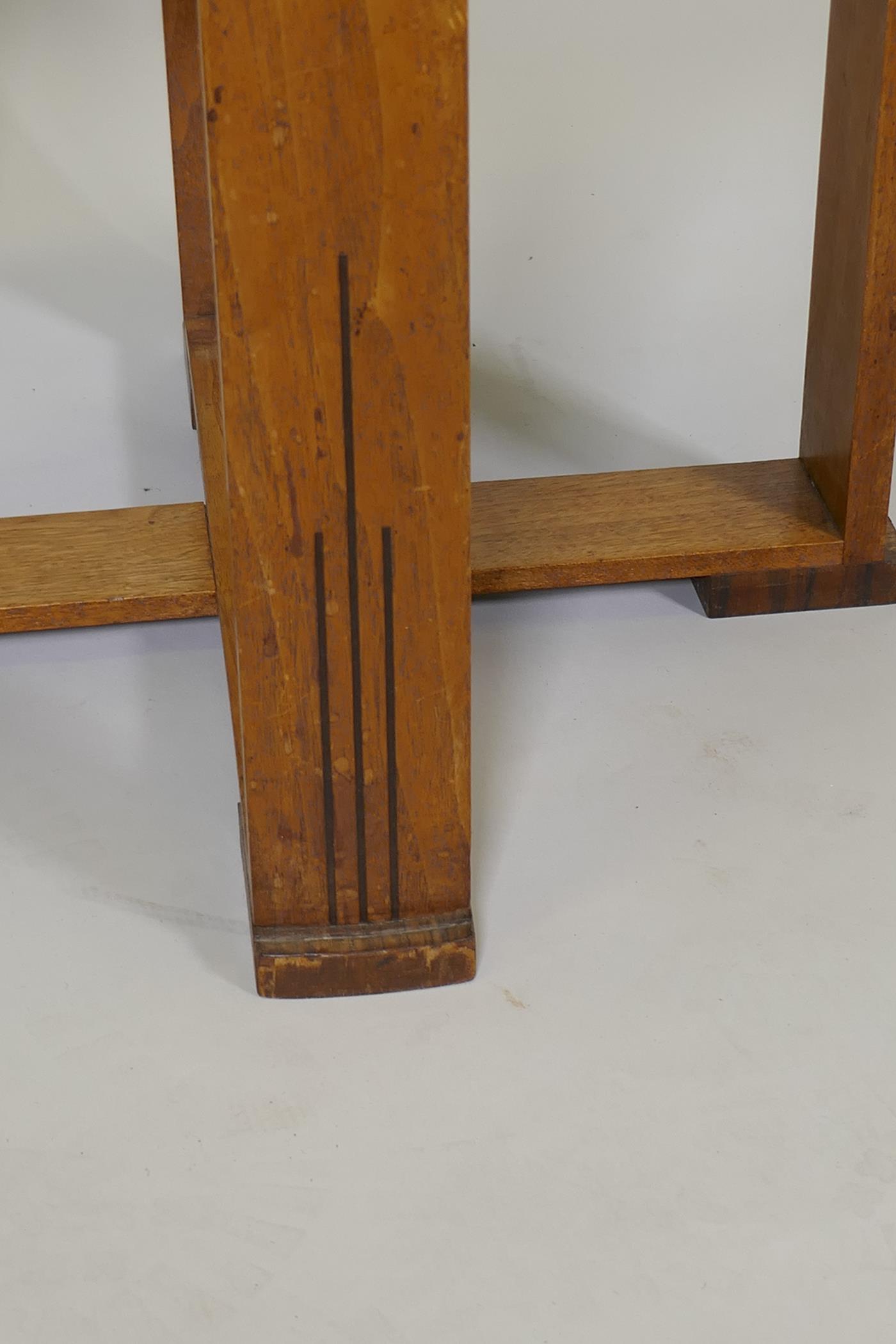 An Art Deco mahogany occasional table on plank supports and cross stretcher, 16½" x 19" diameter - Image 2 of 5