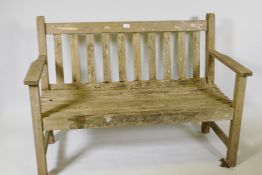 A teak garden bench 47" wide