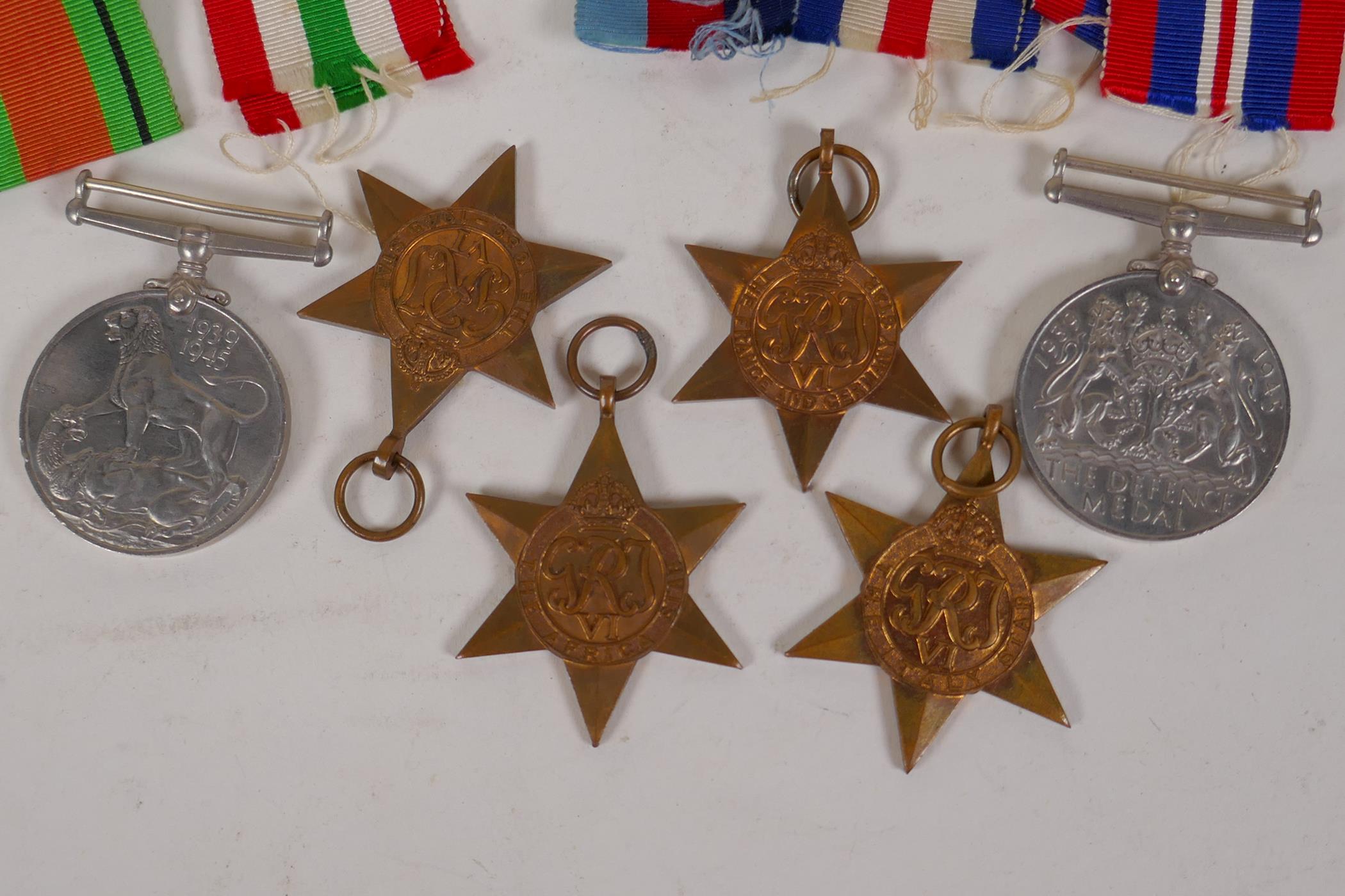 A collection of WWII medals and ribbons, and a Royal Engineers cap badge - Image 4 of 4