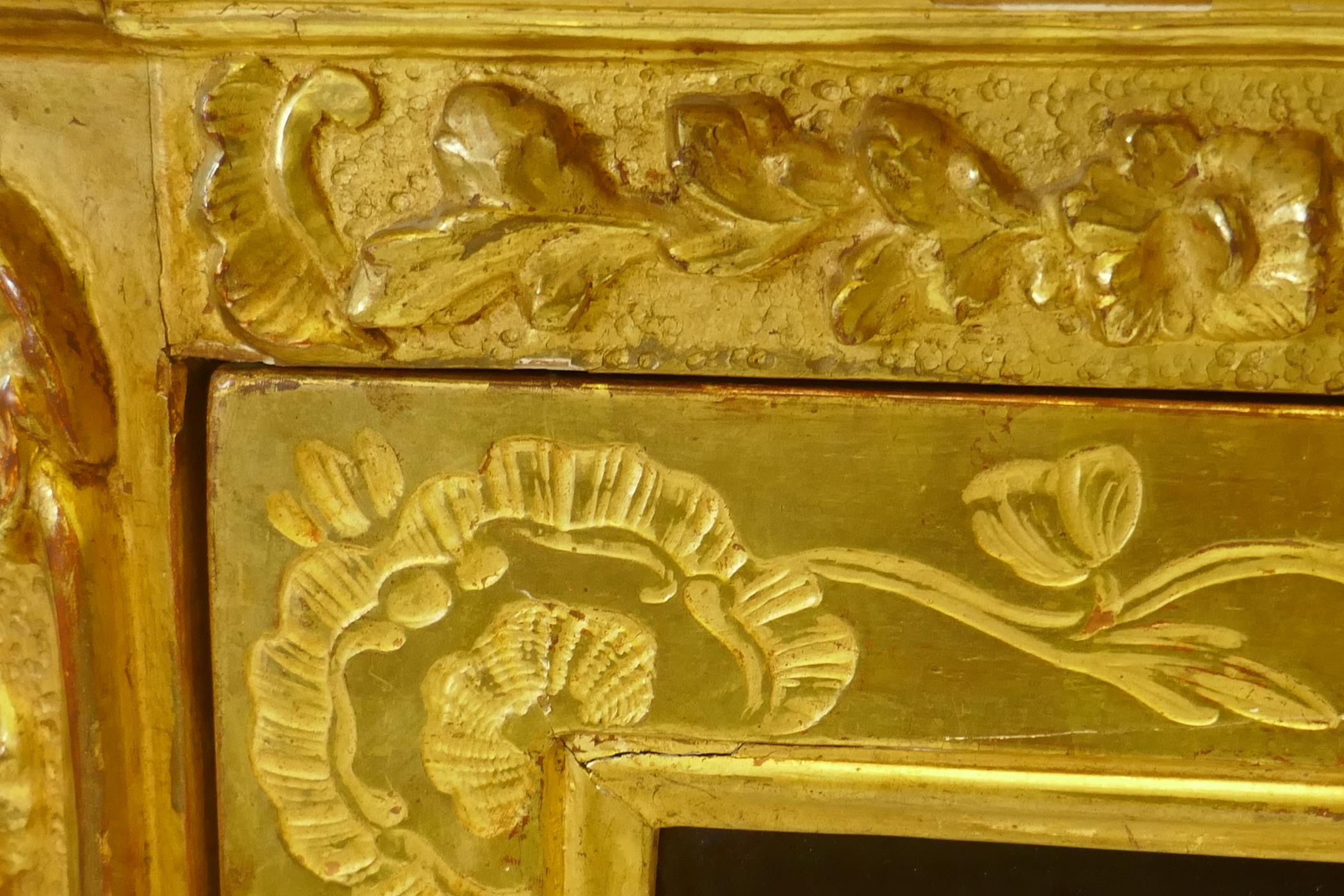 A C19th Italian giltwood corner cabinet, the top with an open shelf supported by dolphins, the - Image 11 of 11